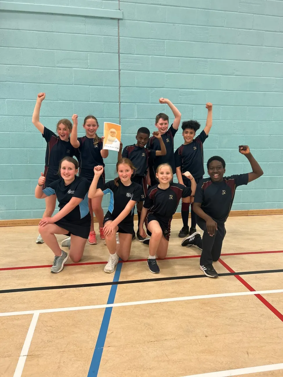 Pupils celebrating sports tournament victory
