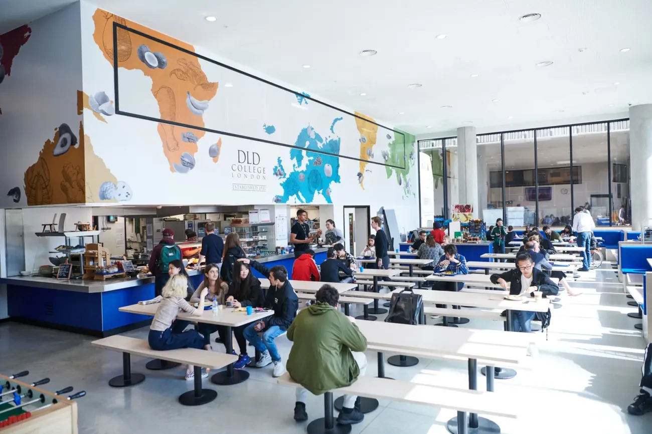 Students dining in busy college cafeteria